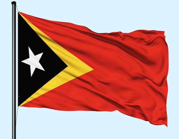 Bandeira de Timor-Leste agitada pelo vento com o poste