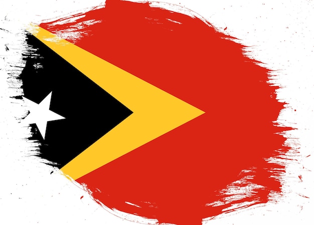 Bandeira de timor-leste em fundo de pincel grunge angustiado