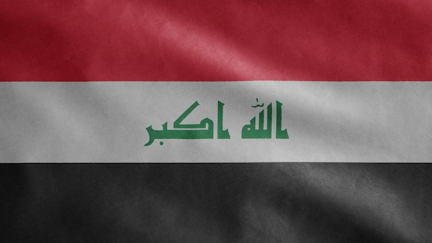 Bandeira do Iraque balançando ao vento. Close up da bandeira do Iraque soprando em seda macia