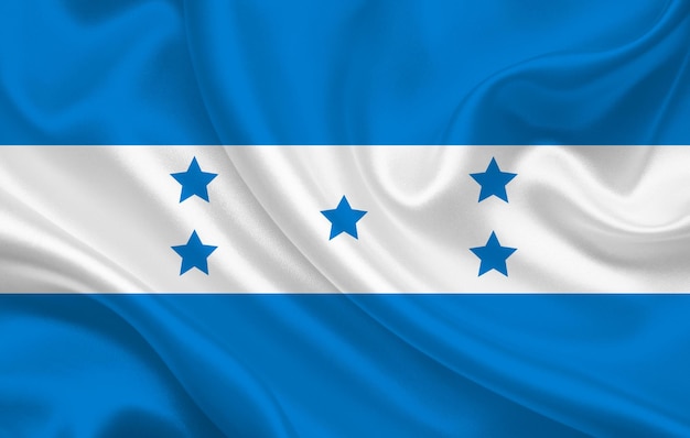 Bandeira do país de Honduras no panorama de fundo de tecido de seda ondulado - ilustração