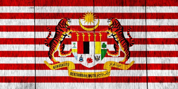 Bandeira e brasão de armas da Malásia em um fundo texturizado Colagem de conceito