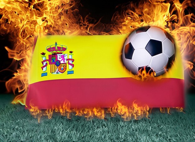 Foto bandeira espanhola e boneca e copo e estádio de futebol e relógio e moldura