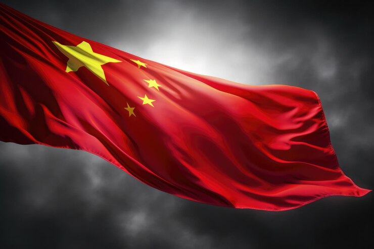 Foto bandeira nacional chinesa contra um fundo cinzento