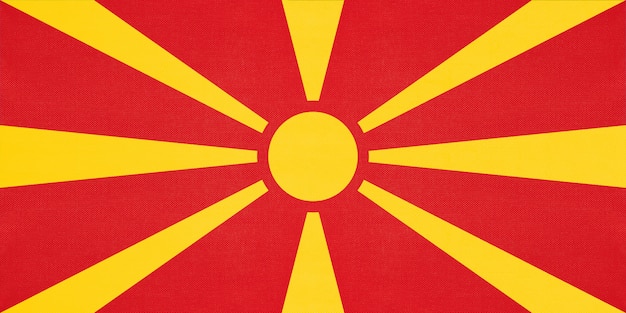 Bandeira nacional da macedônia tecido têxtil fundo, símbolo do país europeu do mundo