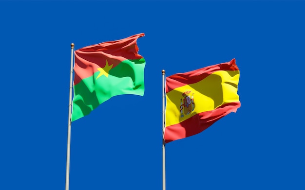 Bandeiras da espanha e do burkina faso. arte 3d