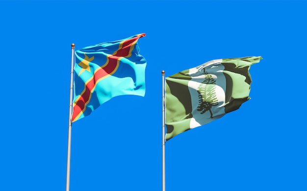 Bandeiras da ilha norfolk e da república democrática do congo no céu azul. arte 3d