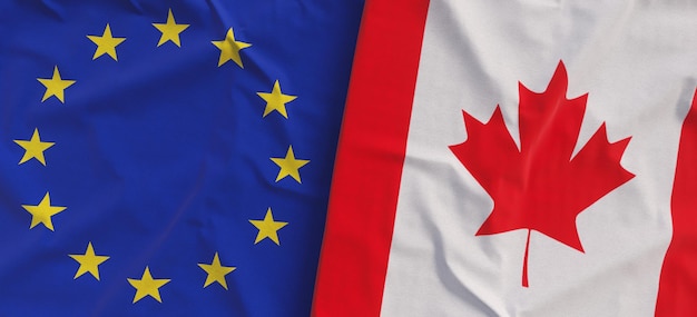 Bandeiras da União Europeia e do Canadá Bandeiras de linho fechadas Bandeira feita de lona Símbolos nacionais de Ottawa da UE do Canadá ilustração 3d