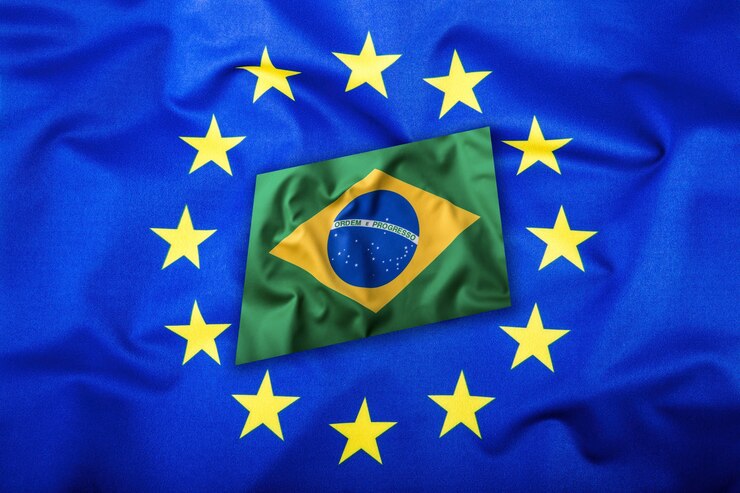 Foto bandeiras do brasil e da união européia. bandeira do brasil e bandeira da ue. bandeira brasileira dentro de estrelas. conceito de bandeira do mundo.