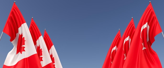 Bandeiras do Canadá e da Turquia em mastros nas laterais em um fundo azul Lugar para texto Seis bandeiras Ottawa maple Istanbul 3d illustration