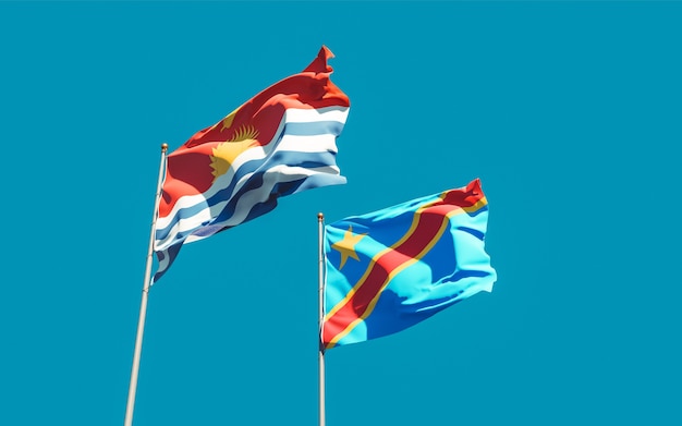 Bandeiras do kiribati e da república democrática do congo no céu azul. arte 3d