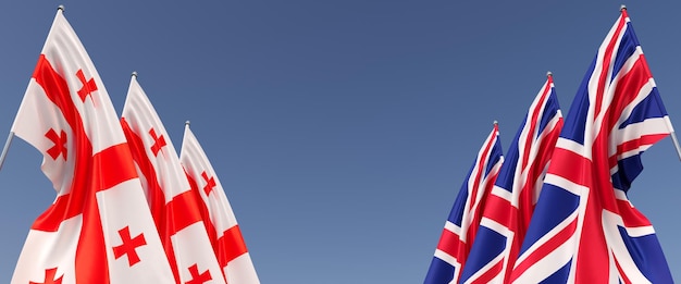 Bandeiras do Reino Unido e da Geórgia em mastros nas laterais Seis bandeiras em um fundo azul Lugar para texto Grã-Bretanha Inglaterra Tbilisi ilustração 3D