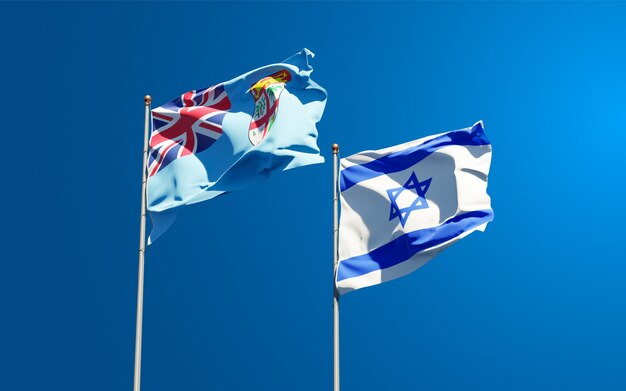 bandeiras estaduais de Fiji e Israel juntas no fundo do céu