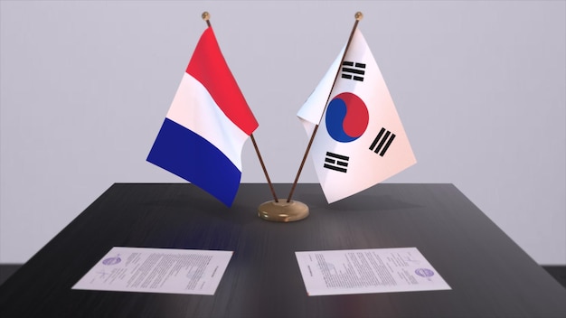 Bandeiras nacionais da Coreia do Sul e da França na mesa na sala de conferências diplomáticas Acordo de acordo político
