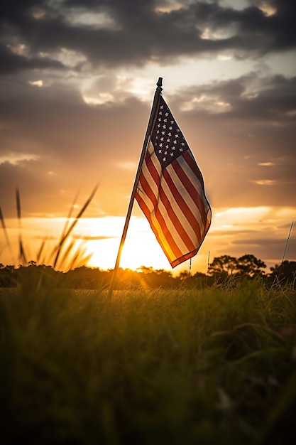 Una bandera de américa con la puesta de sol detrás de ella concepto de foto de celebración del día conmemorativo de américa