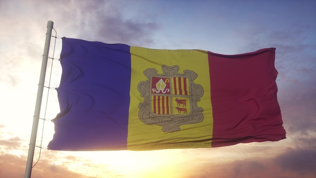 Bandera de Andorra ondeando en el fondo del viento, el cielo y el sol. Representación 3D.