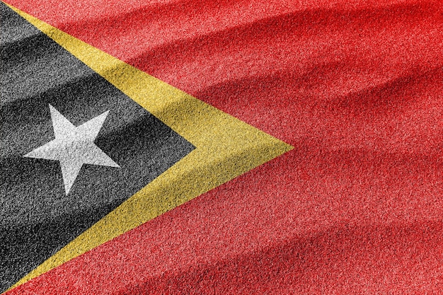 Bandera de arena de Timor Oriental Bandera nacional de fondo de arena