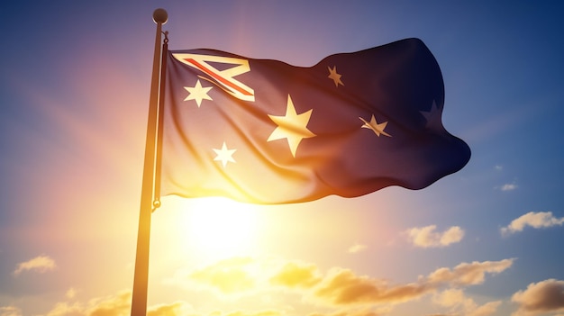 Bandera de Australia 2 ondeando en el viento contra un cielo azul y nubes