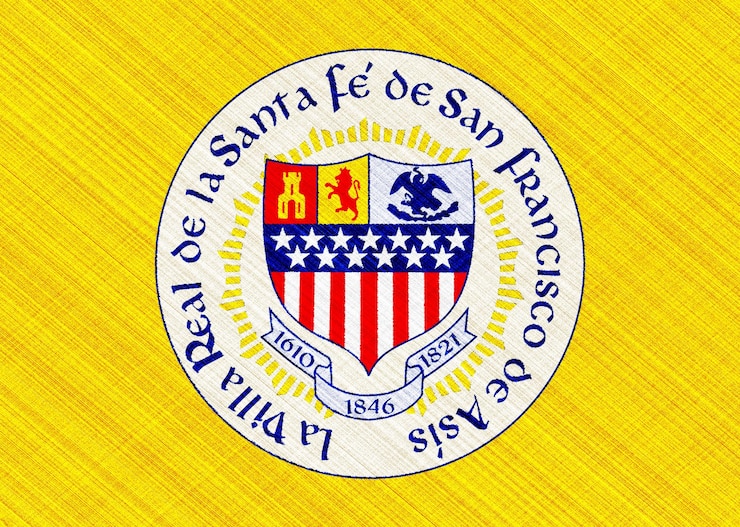 Foto bandera de la ciudad de santa fe, nuevo méxico, estados unidos sobre un fondo de textura de tela collaje conceptual