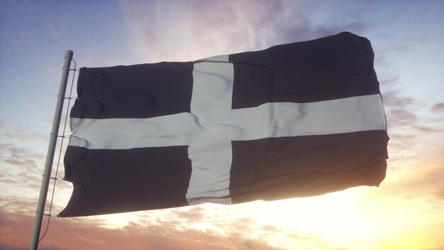 Bandera de Cornualles, Inglaterra, ondeando en el fondo del viento, el cielo y el sol. Representación 3d