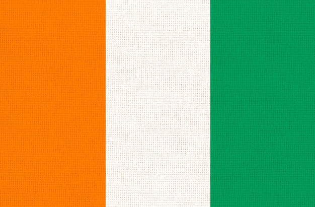 Bandera de Côte d'Ivoire en la superficie de la tela Bandera nacional de Costa de Marfil en el textil