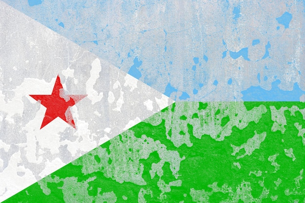 Bandera de Djibouti en una superficie rústica de muro de hormigón antiguo