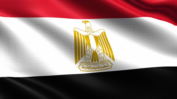 Bandera de Egipto, con textura de tela ondeando.