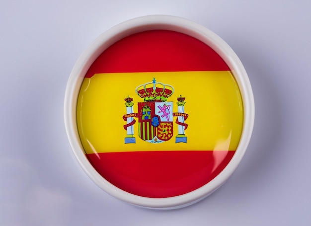 Foto bandera española y muñeca y copa y estadio de fútbol y reloj y marco