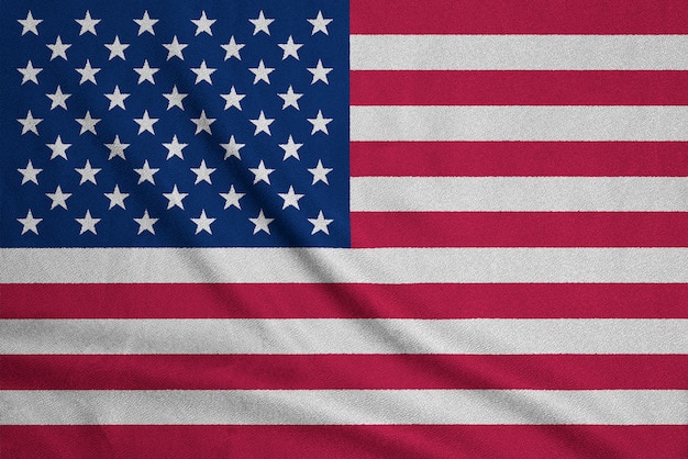 Bandera de Estados Unidos sobre tela con textura. Símbolo patriótico