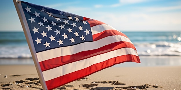 La bandera estadounidense ondea en el aire en la playa.