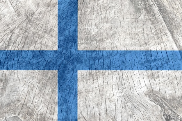 Bandera de finlandia en una superficie de madera vieja