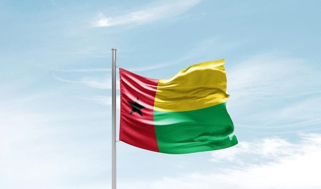 La bandera de Guinea-Bissau ondeando en el cielo