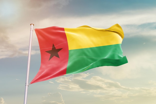 La bandera de Guinea-Bissau ondeando en el cielo