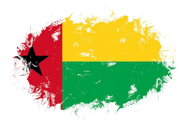 Bandera de guinea bissau sobre fondo de pincel de trazo abstracto