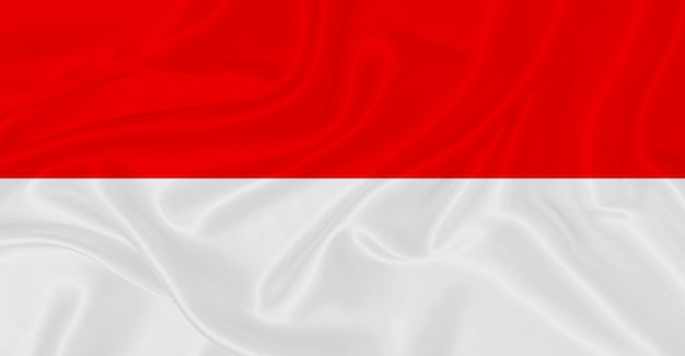 Foto bandera de indonesia volando en el aire