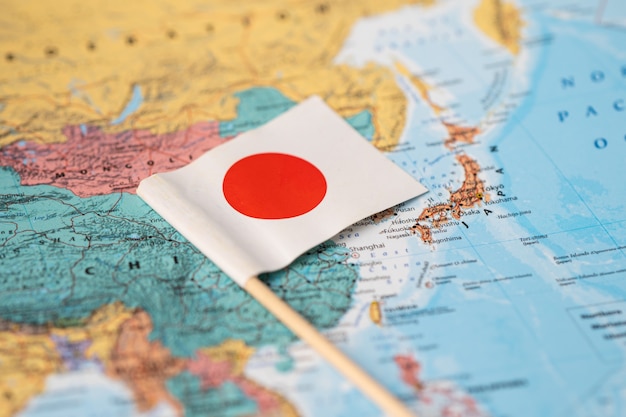 Foto bandera de japón en el mapa del mundo