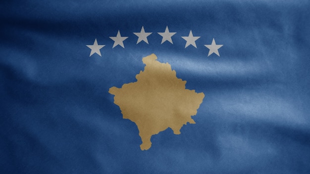 Foto bandera de kosovo ondeando en el viento. cerca de kosovo banner soplado, seda suave y lisa. fondo de la bandera de la textura de la tela del paño.