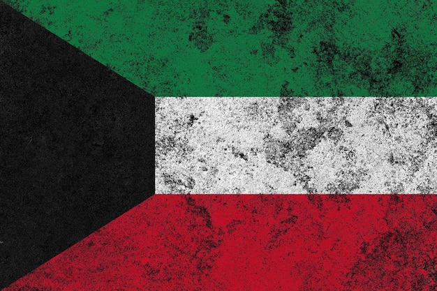 Bandera de Kuwait en una vieja superficie de muro de hormigón dañada