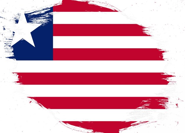 Foto bandera de liberia sobre fondo de pincel grunge angustiado