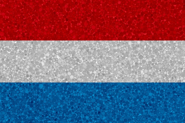 Bandera de Luxemburgo en textura de espuma de poliestireno