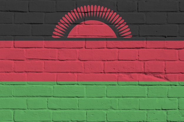 Bandera de Malawi representada en colores de pintura en la pared de ladrillo antiguo.