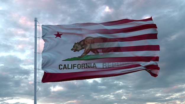 Foto bandera mixta de estados unidos y california ondeando en el viento