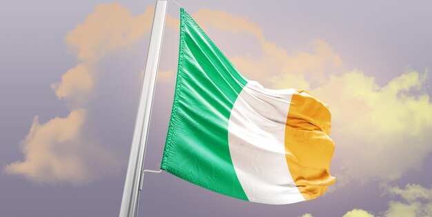 Foto la bandera nacional de irlanda ondeando en el hermoso cielo