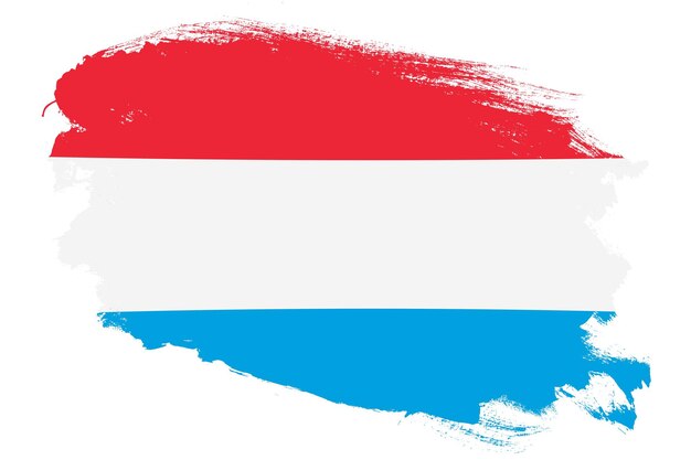 Foto bandera nacional de luxemburgo sobre fondo blanco con textura de pincel de trazo grunge
