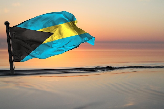 Una bandera nacional del país de Bahamas en un fondo de ver