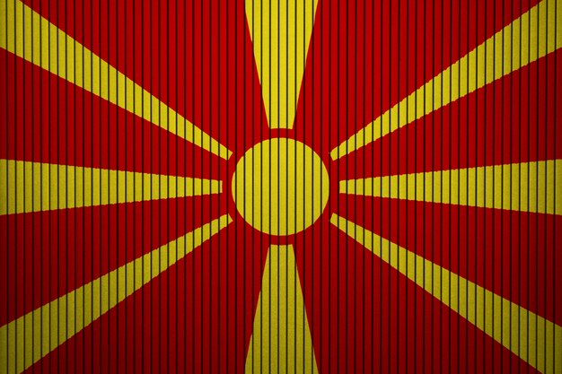 Bandera nacional pintada de Macedonia en un muro de hormigón