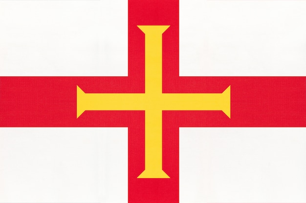 Foto bandera nacional de tela de la isla de guernsey