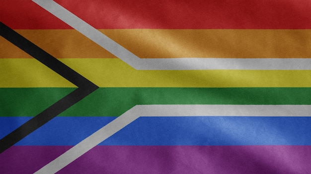 Bandera del orgullo gay de Sudáfrica ondeando en el viento. Cerca de la bandera de la comunidad LGBT de Sudáfrica soplando seda suave