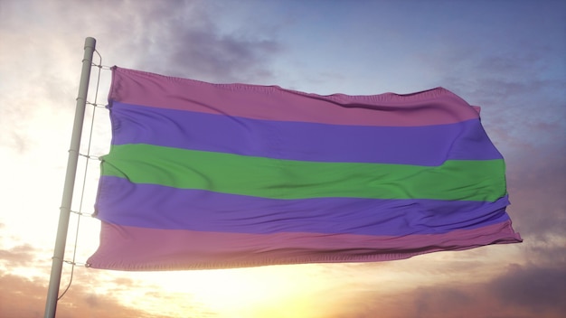 Bandera del orgullo Trigender ondeando en el fondo del viento, el cielo y el sol. Representación 3d