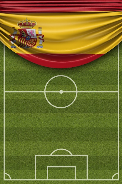 Foto la bandera del país de españa cubrió un campo de fútbol de fútbol 3d rendering