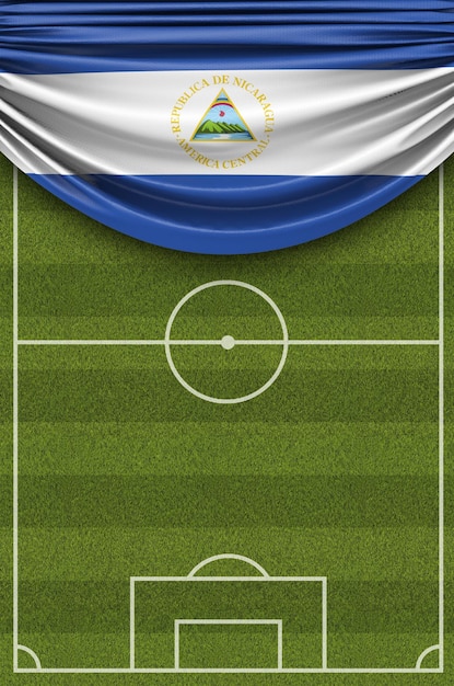 La bandera del país de Nicaragua cubrió un campo de fútbol de fútbol 3D Rendering